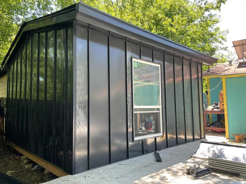 Black standing seam metal wall panels for Metal Roof Installation in North Adams