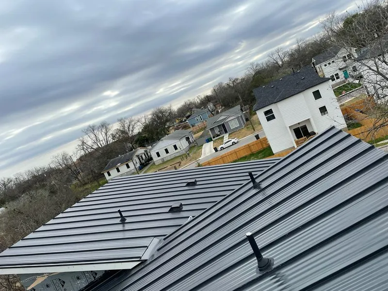 Standing seam metal roof panels with vents for Skylight Repair in North Adams